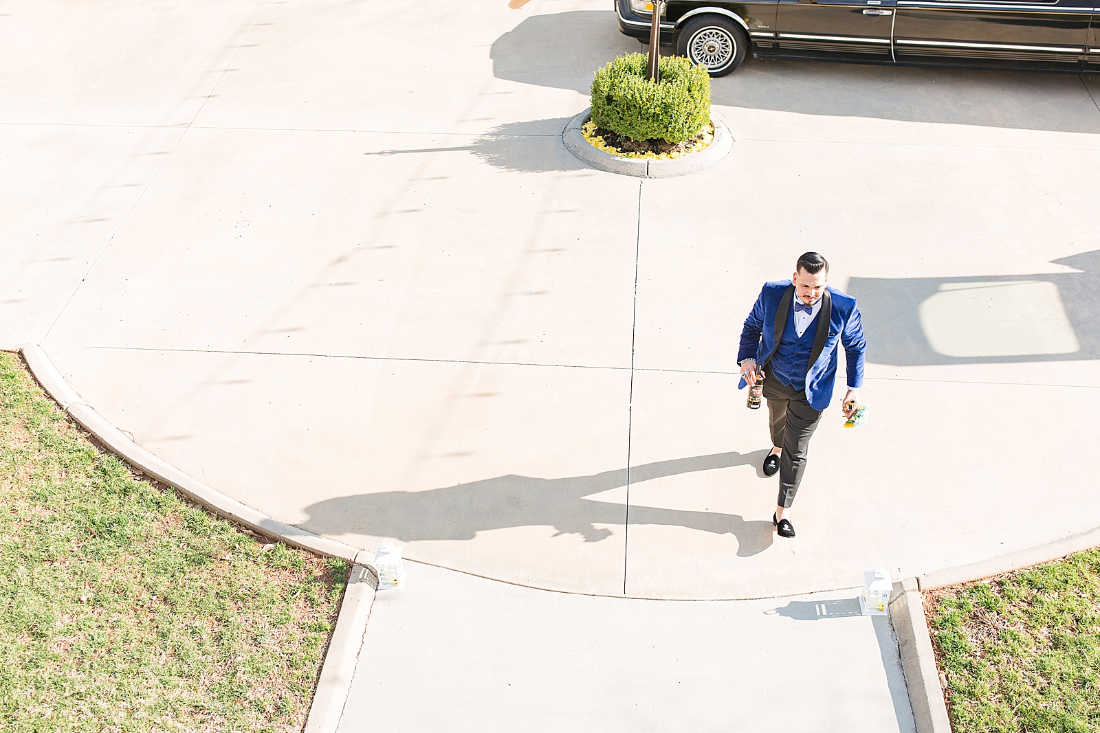 Mooresville Wedding Groom walking on sidewalk Photo