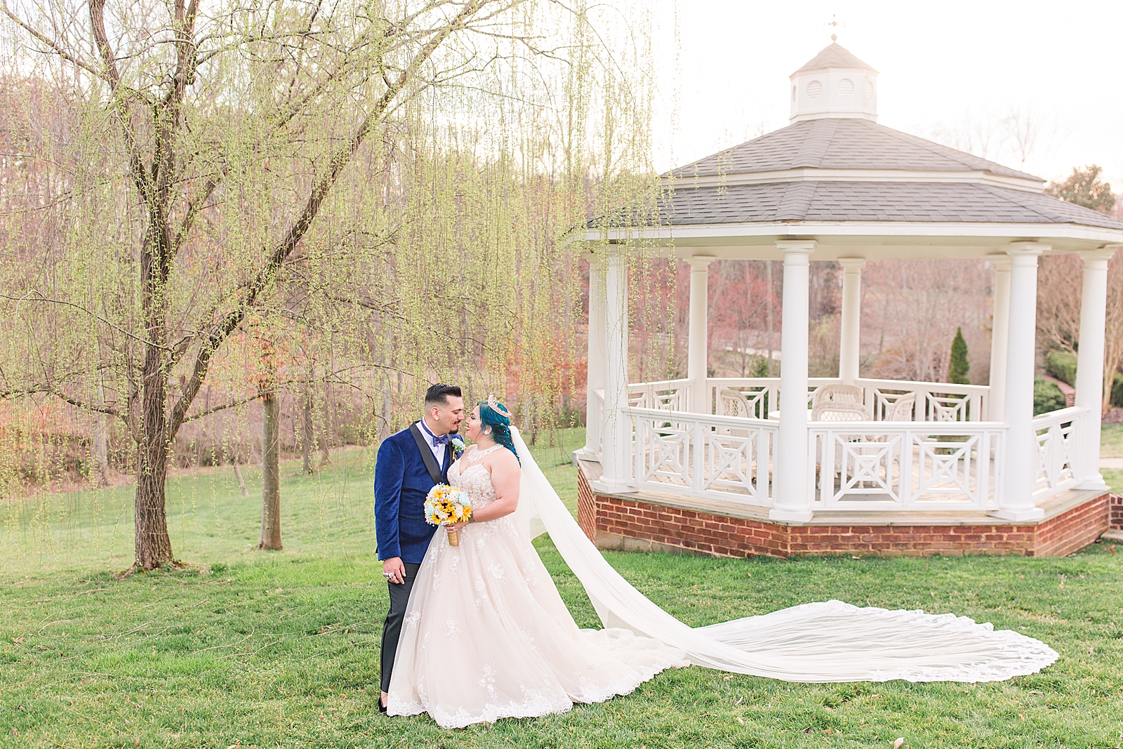 Mooresville Wedding Bride and Groom in front of Gazebo smiling at each other Photo