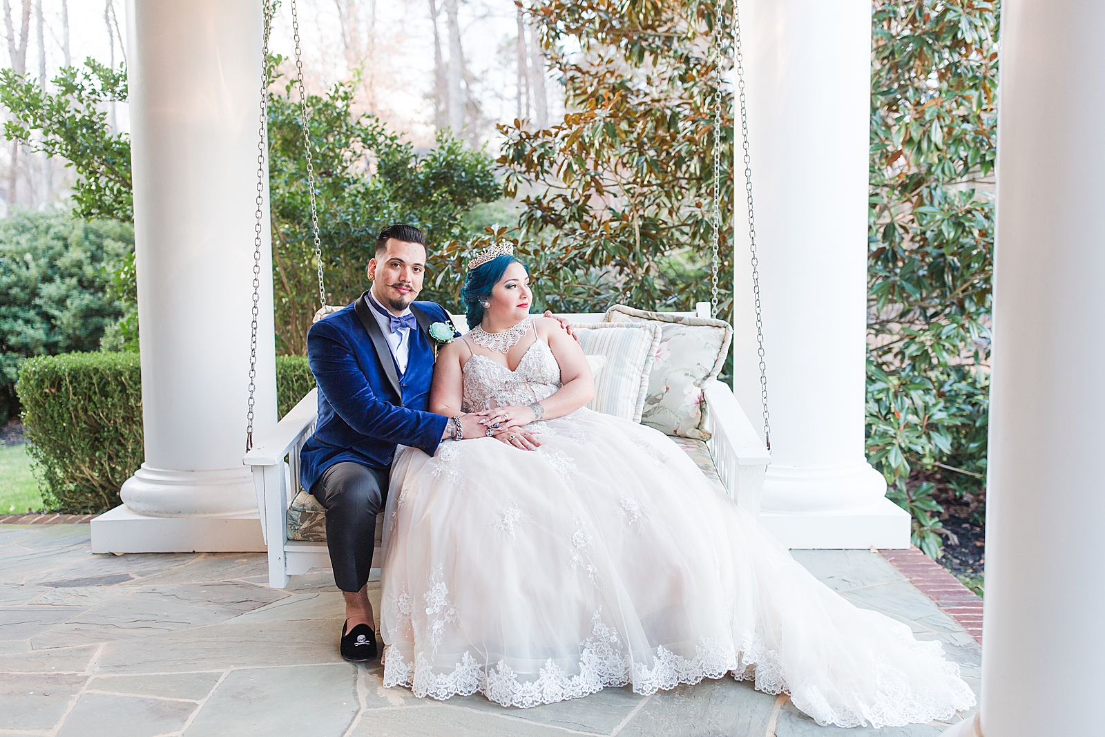 Mooresville Wedding Bride and Groom sitting on porch swing Photo