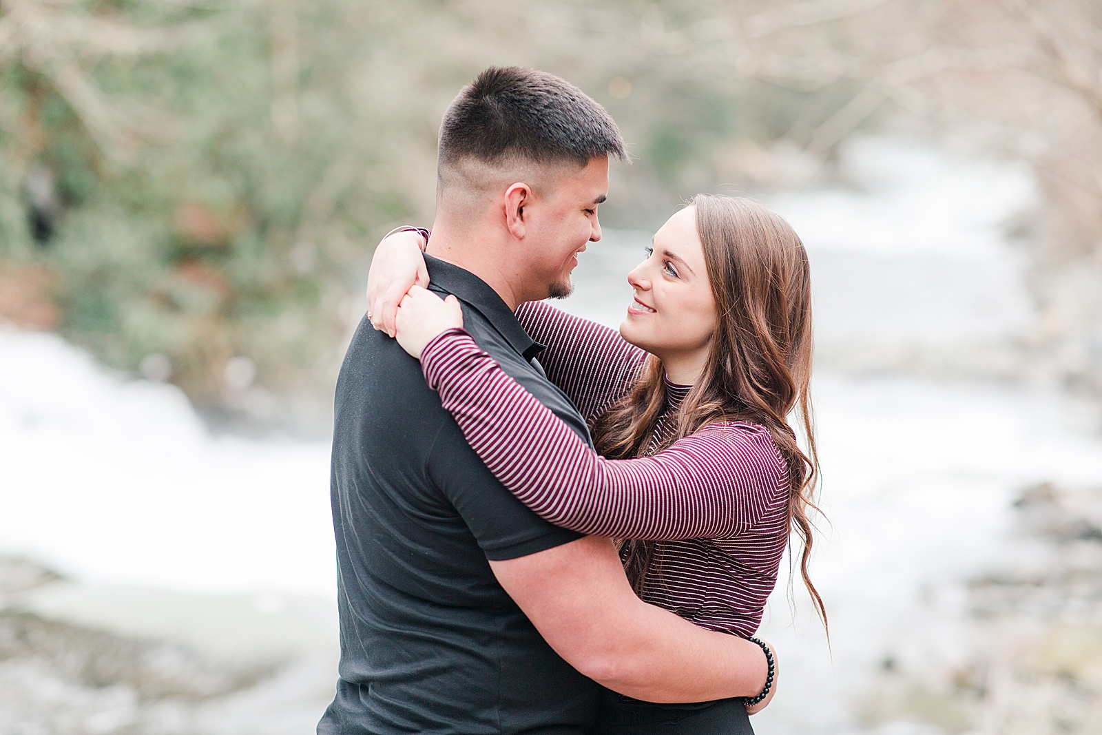Nantahala River Spring Session Couple hugging and smiling at each other photo