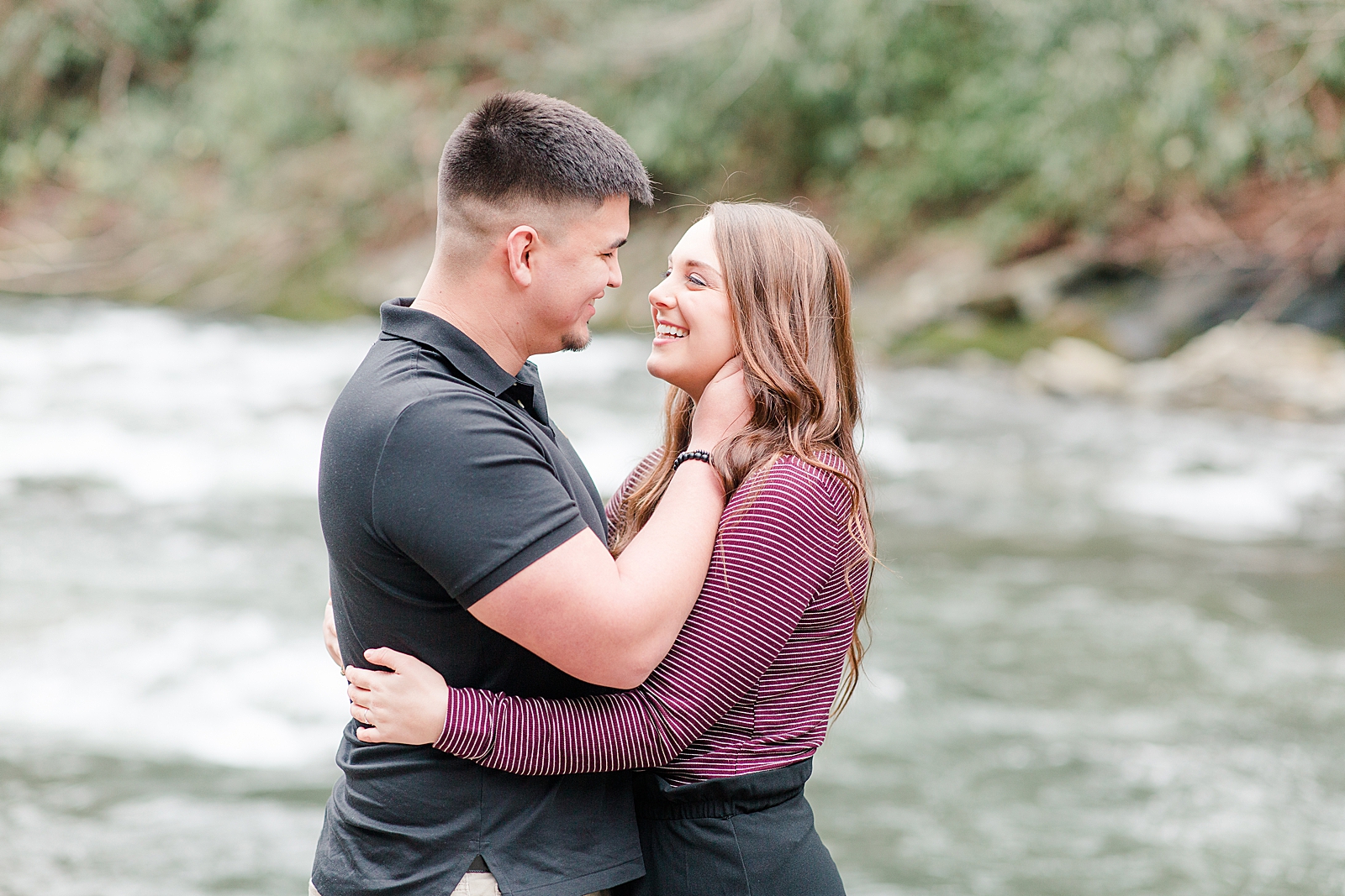 Nantahala River Spring Session Couple smiling at each other photo