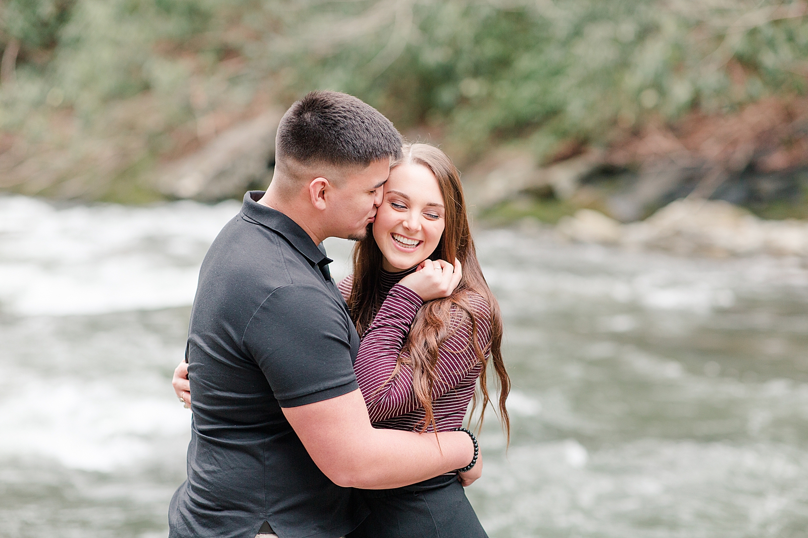 Nantahala River Spring Session Spencer kissing Erin on the cheek and laughing Photo