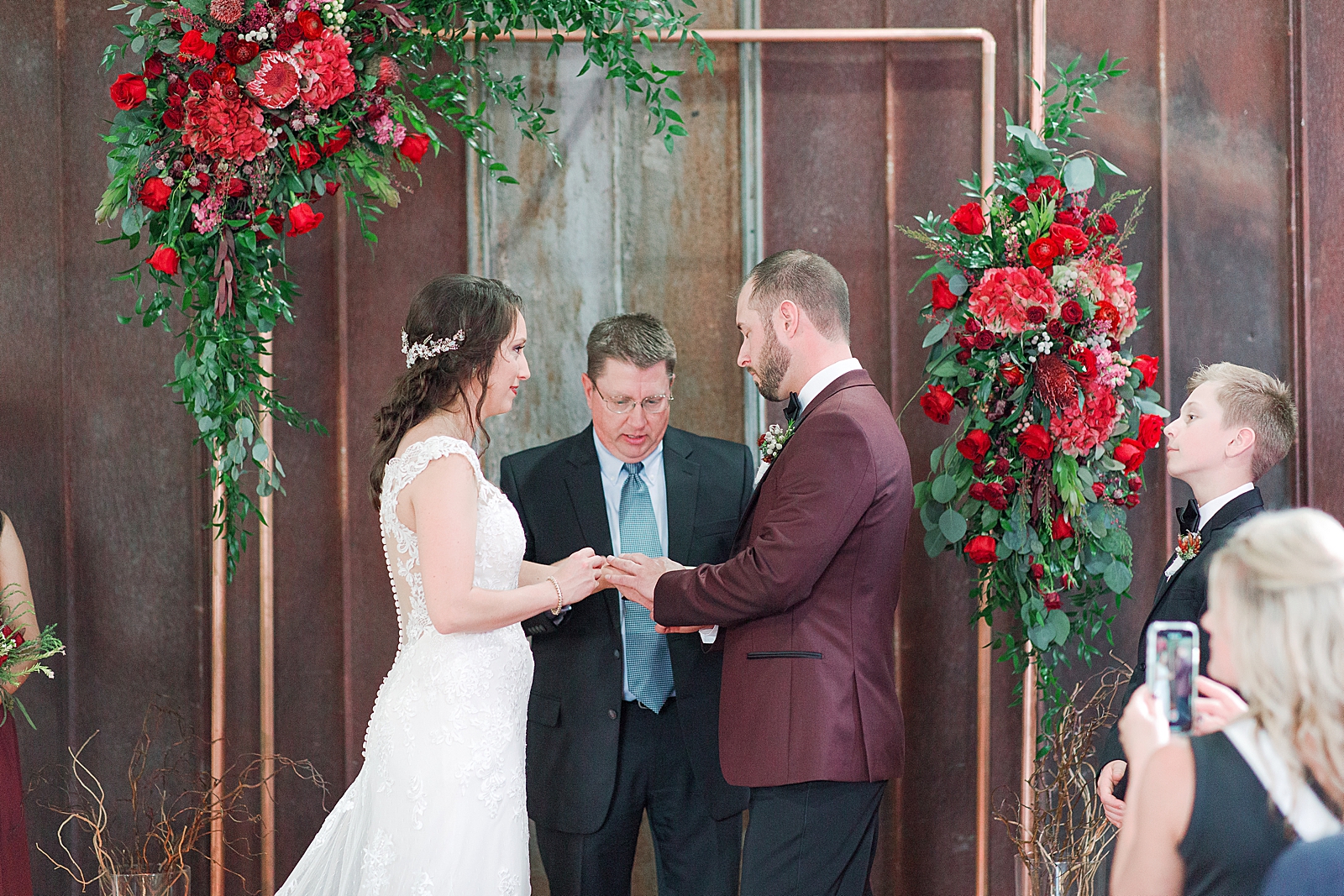 Hackney Warehouse Wedding Ceremony Bride and Groom exchanging rings Photo