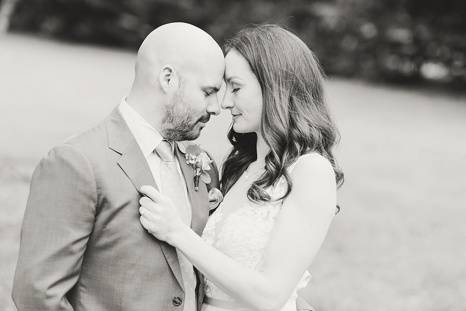Spring Hawkesdene Wedding Black and white of bride and groom nose to nose Photo