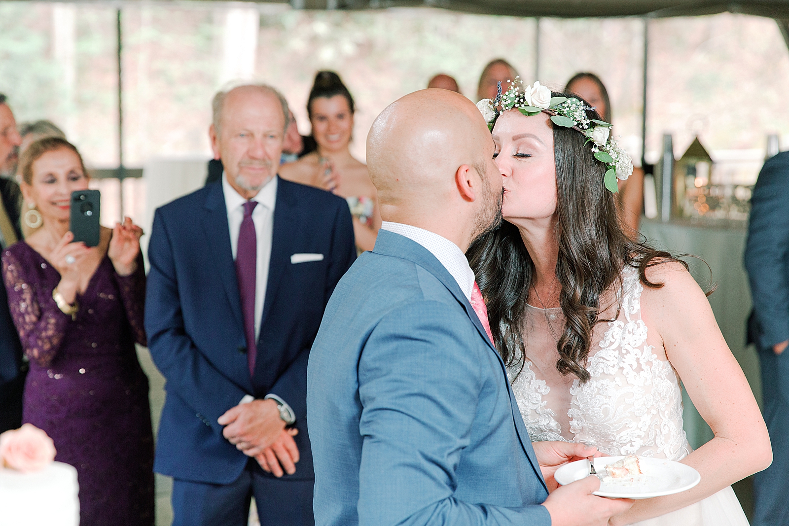 Spring Hawkesdene Wedding Reception Bride and Groom Kissing Photo