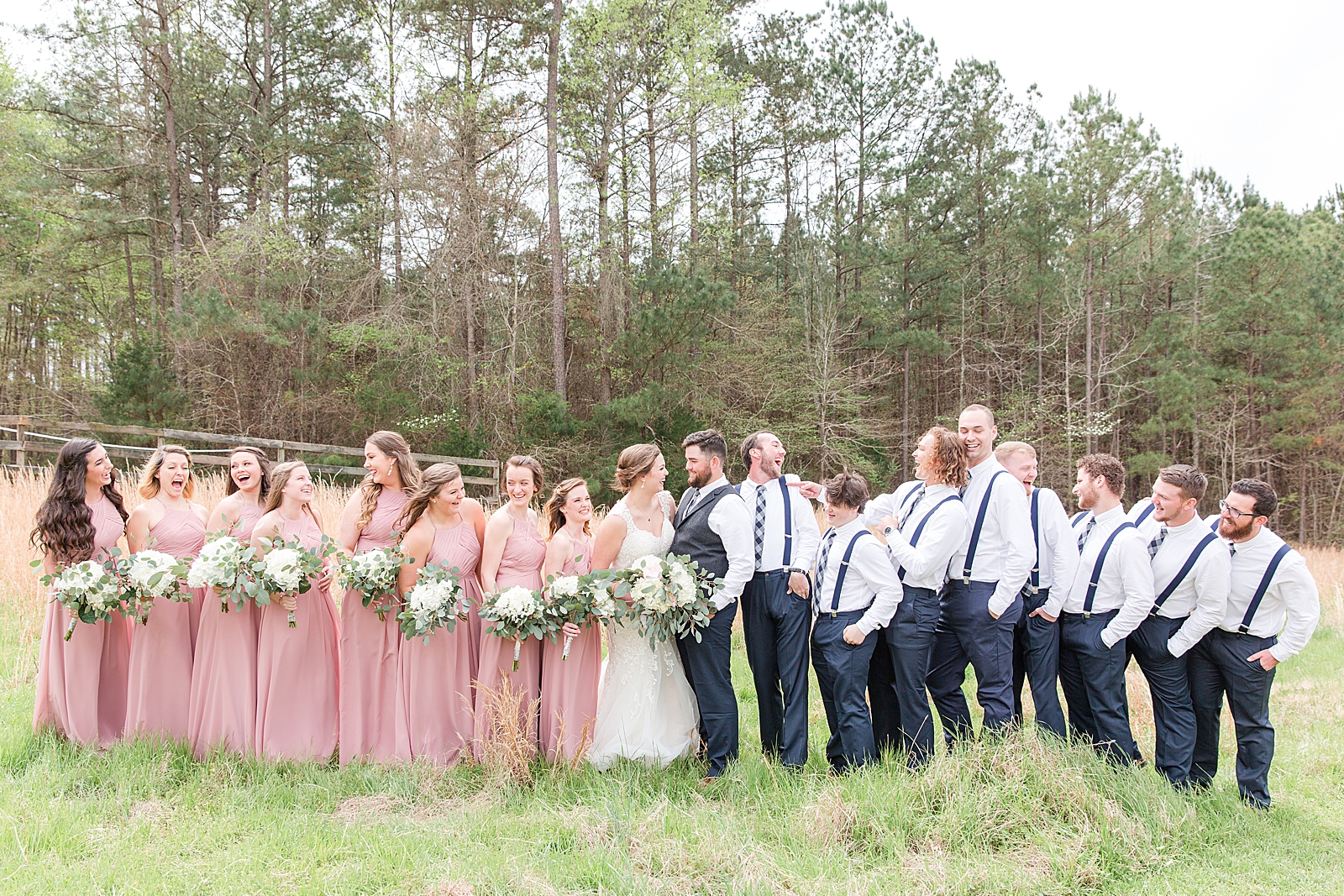 Macedonia Hills Wedding Bridal Party Laughing in Field photo