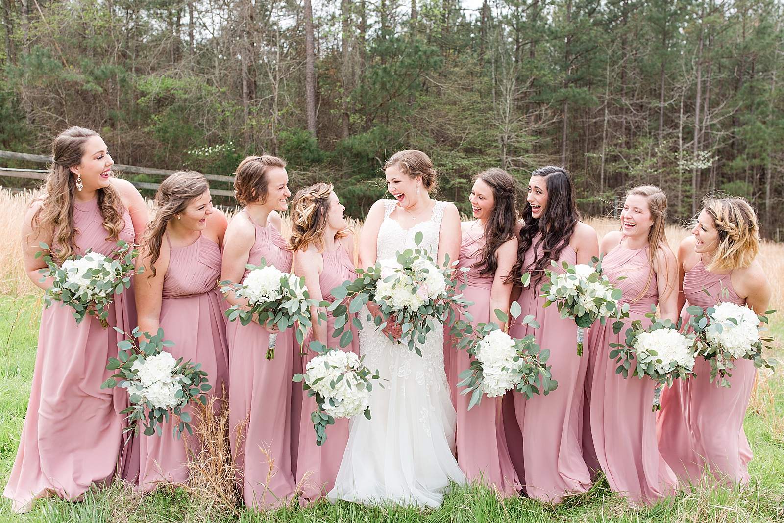 Macedonia Hills Wedding Bride with Bridesmaids in Dusty Rose and White Hydrangea Flowers Laughing in Field Photo