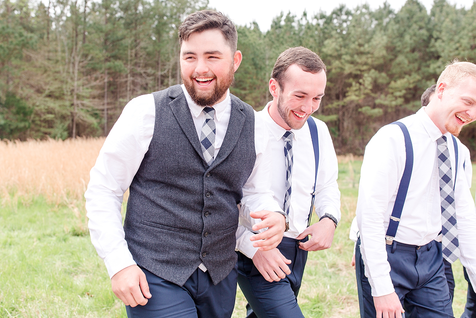 Macedonia Hills Wedding Groom with Groomsmen in field laughing Photo