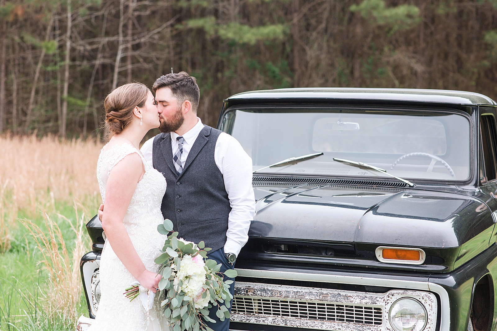 Macedonia Hills Wedding Bride and Groom in Field in front of Chevy Photo