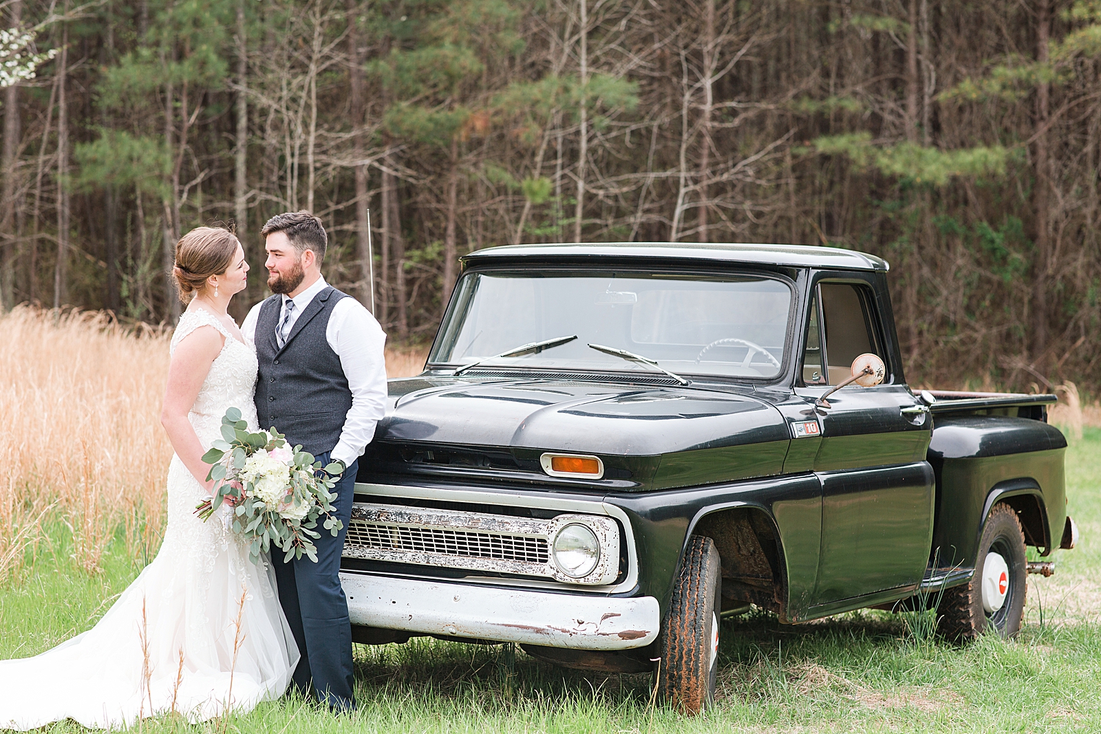 Macedonia Hills Wedding Bride and Groom in Field in front of Chevy Photo