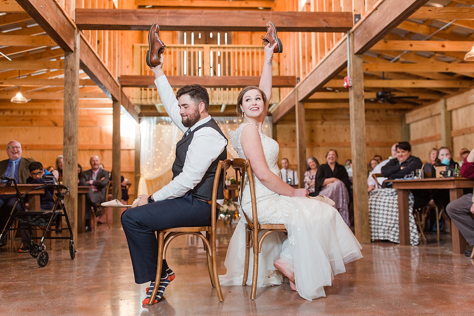 Macedonia Hills Wedding Reception Bride and Groom shoe game photo
