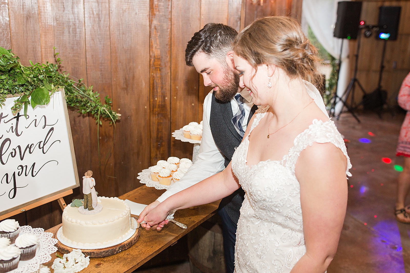 Macedonia Hills Wedding Reception Bride and Groom Cutting Cake Photo