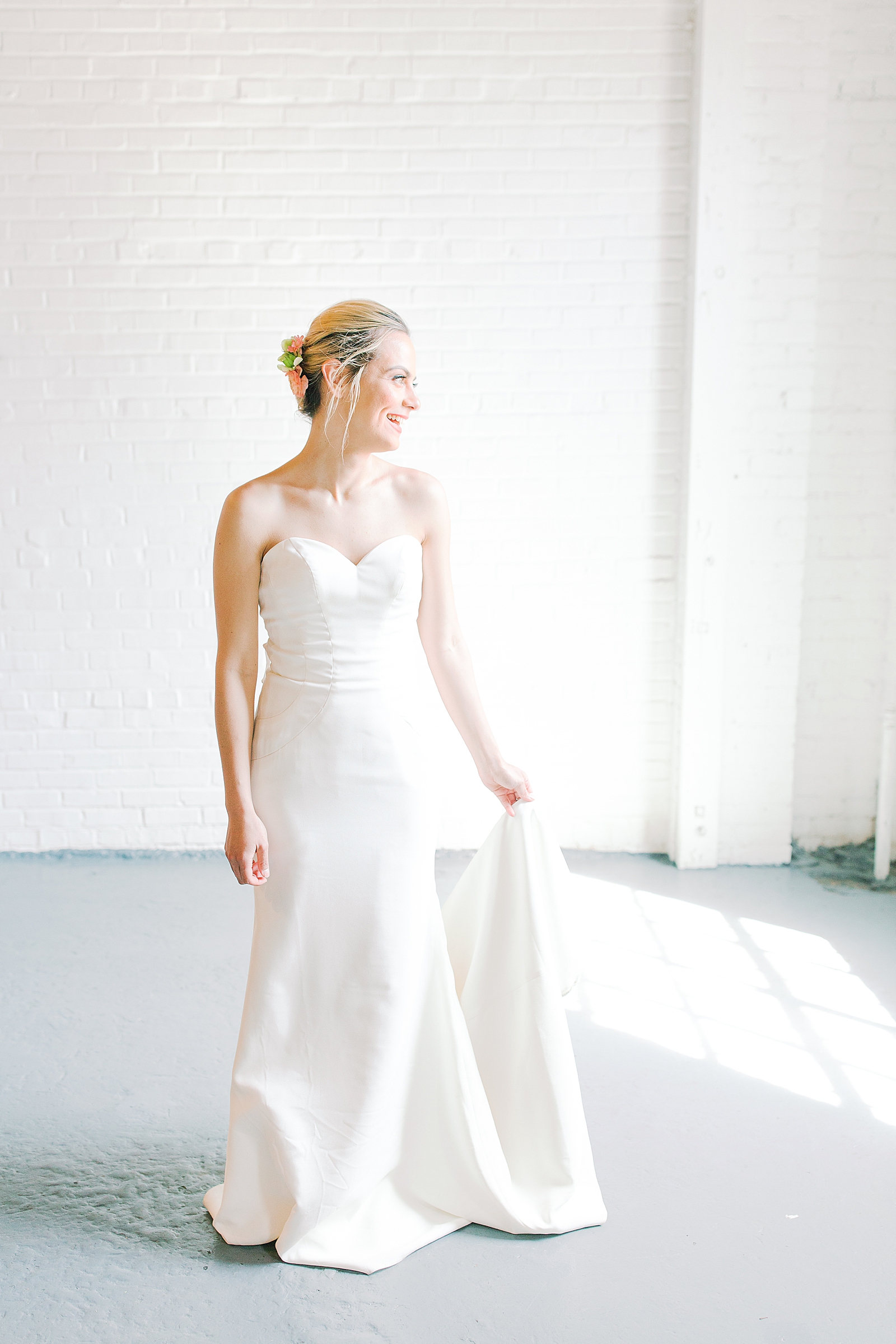 Spring Brickyard Wedding Bride Looking out window and Laughing Photo