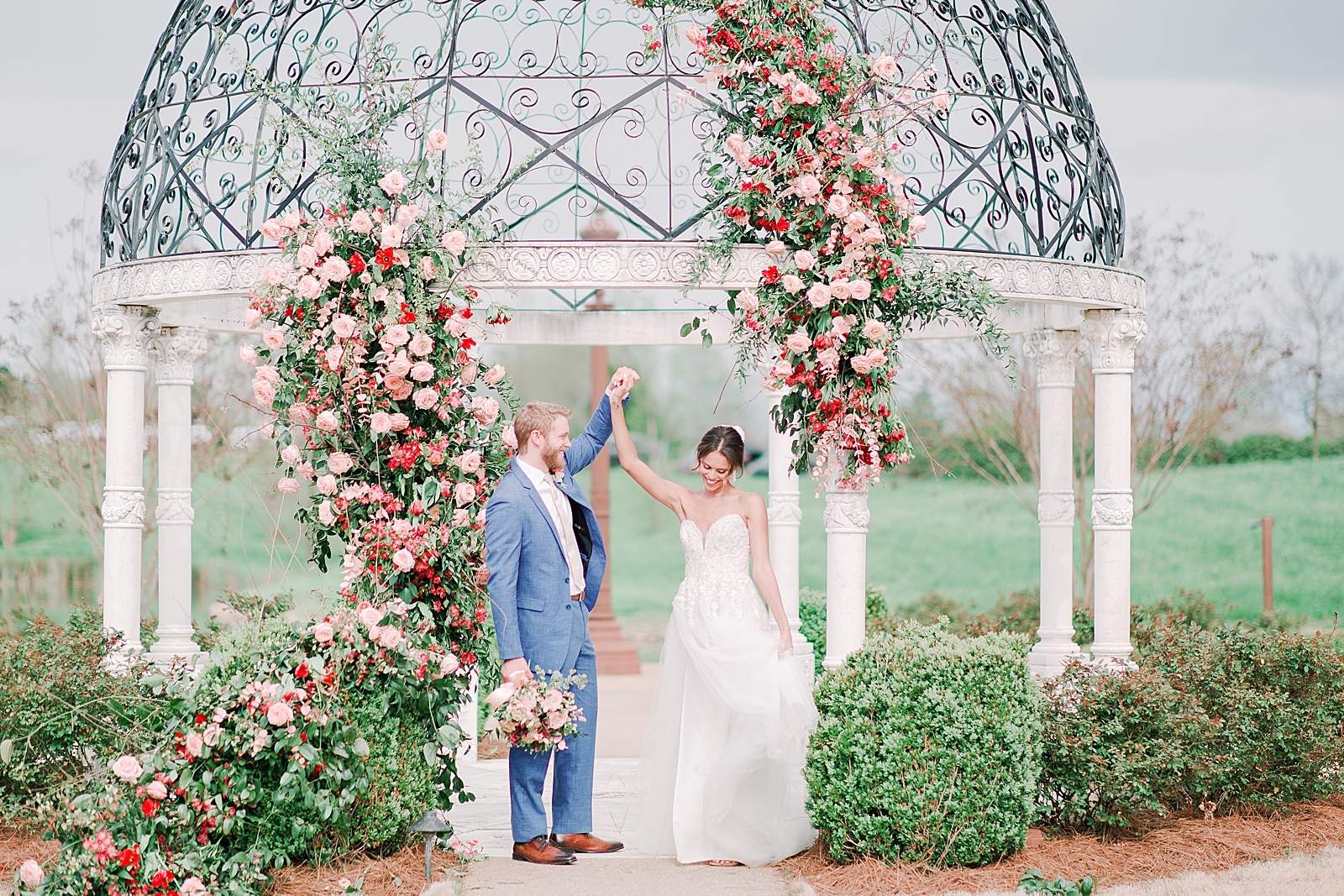 2400 On The River Wedding Couple Dancing in front of Gazebo covered in flowers Photo