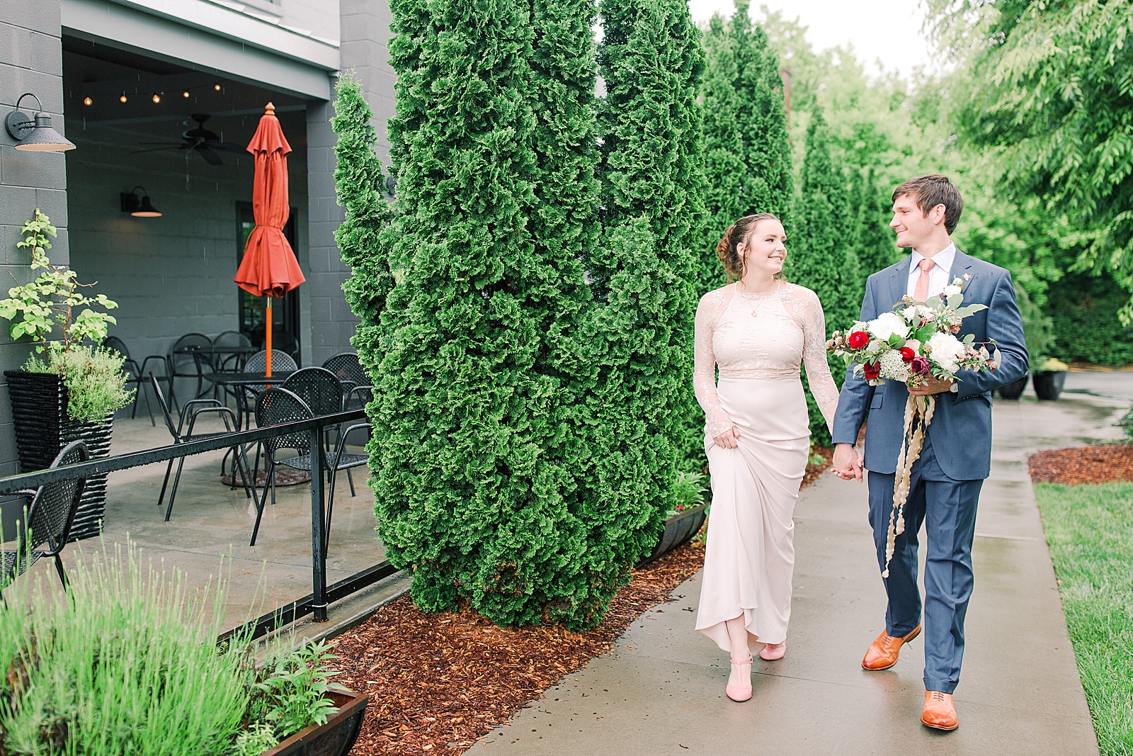 Asheville Wedding Bride and Groom Holding hands walking toward camera Photo