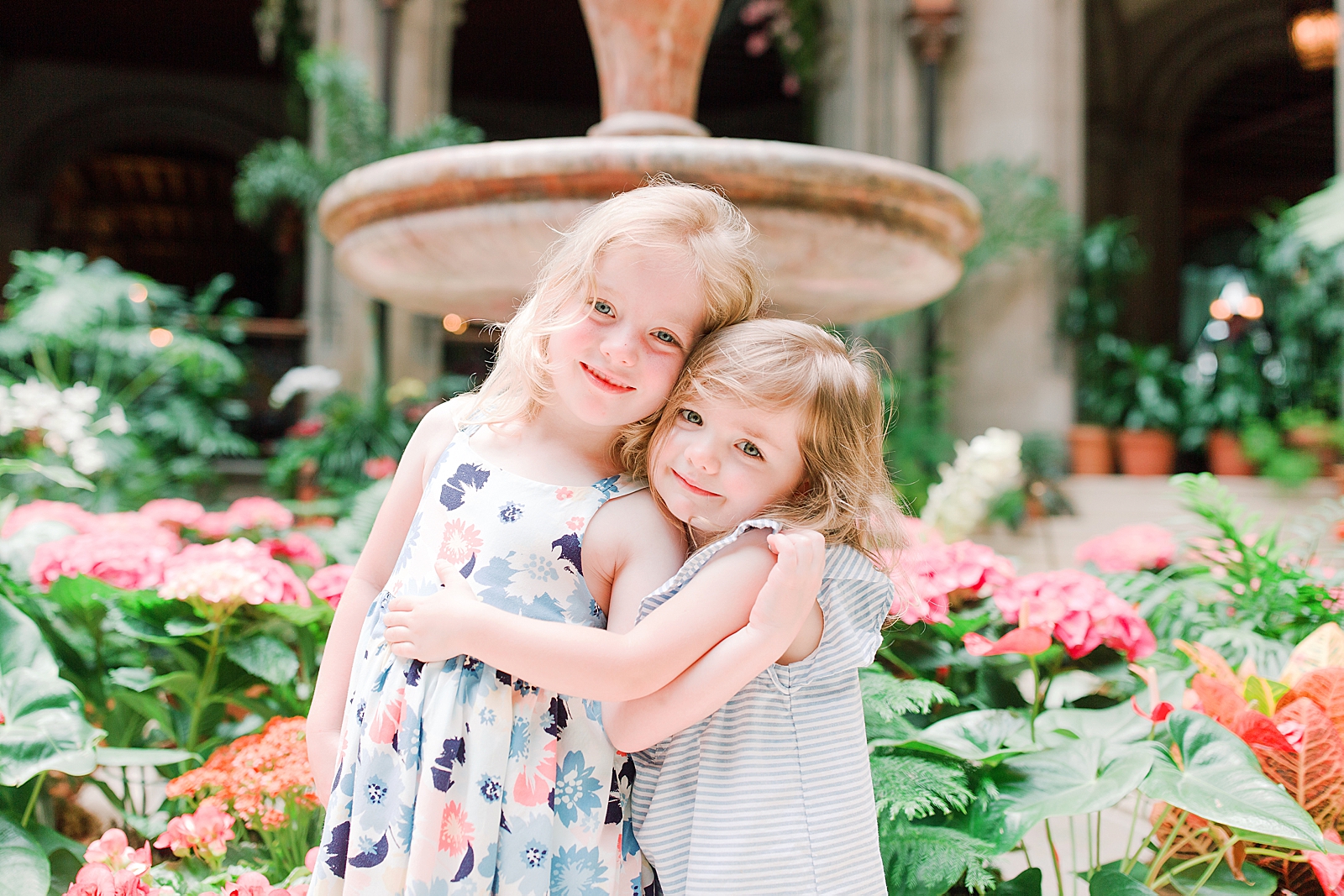 Biltmore House and Gardens Sisters hugging in the winter garden Photo