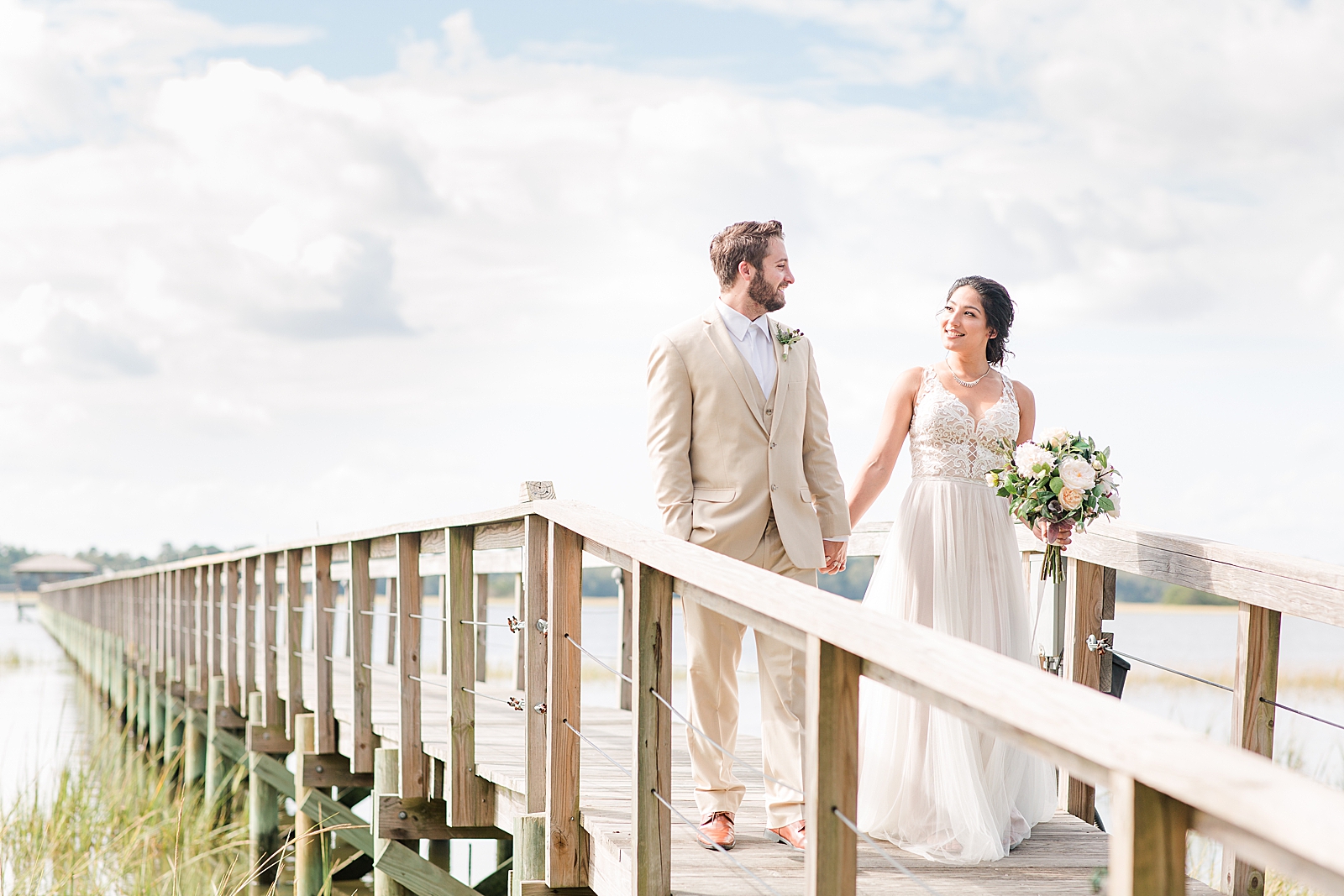 Charleston Wedding at Lowndes Grove couple walking on dock Photo