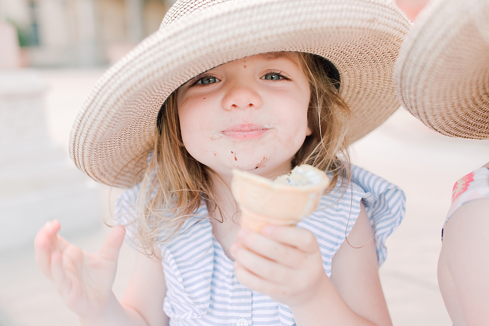 Biltmore House and Gardens Little girl with hat on eating ice cream Photo