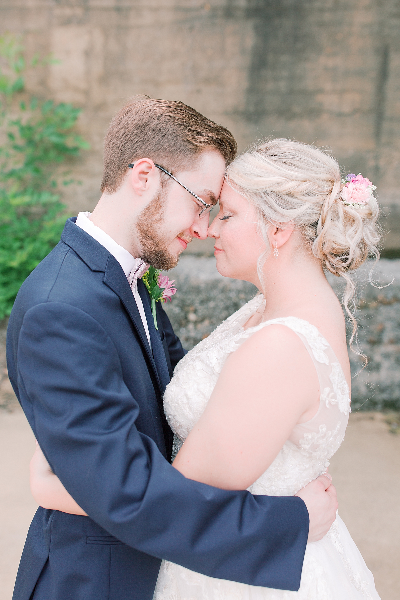 Black Fox Farms Garden Wedding Couple Nose to Nose Hugging Photo