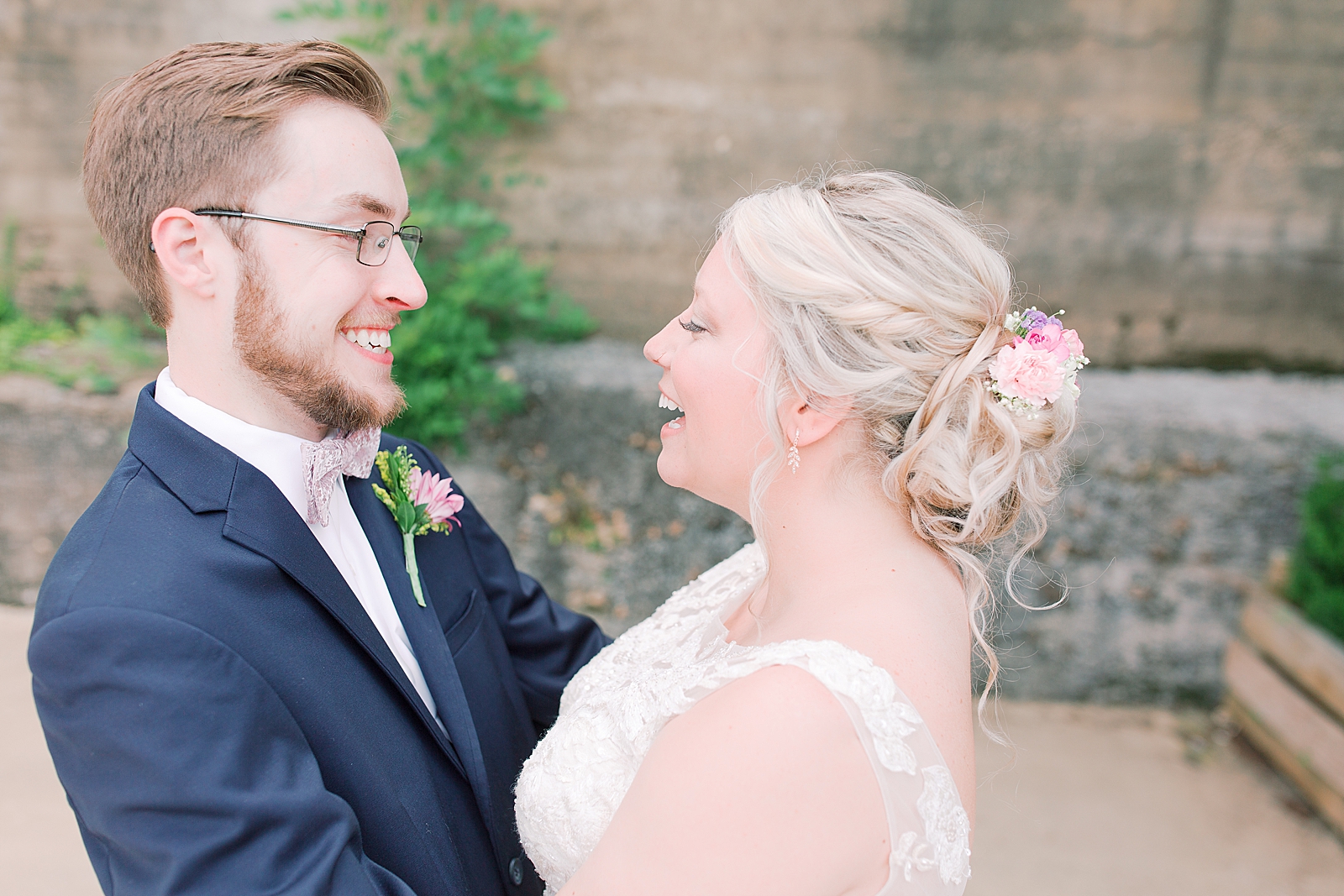 Black Fox Farms Garden Wedding Bride and Groom Laughing at Each Other Photo