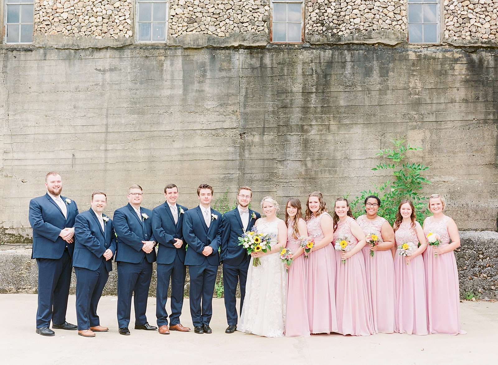 Black Fox Farms Garden Wedding Bridal Party In Front Of Old Building Photo