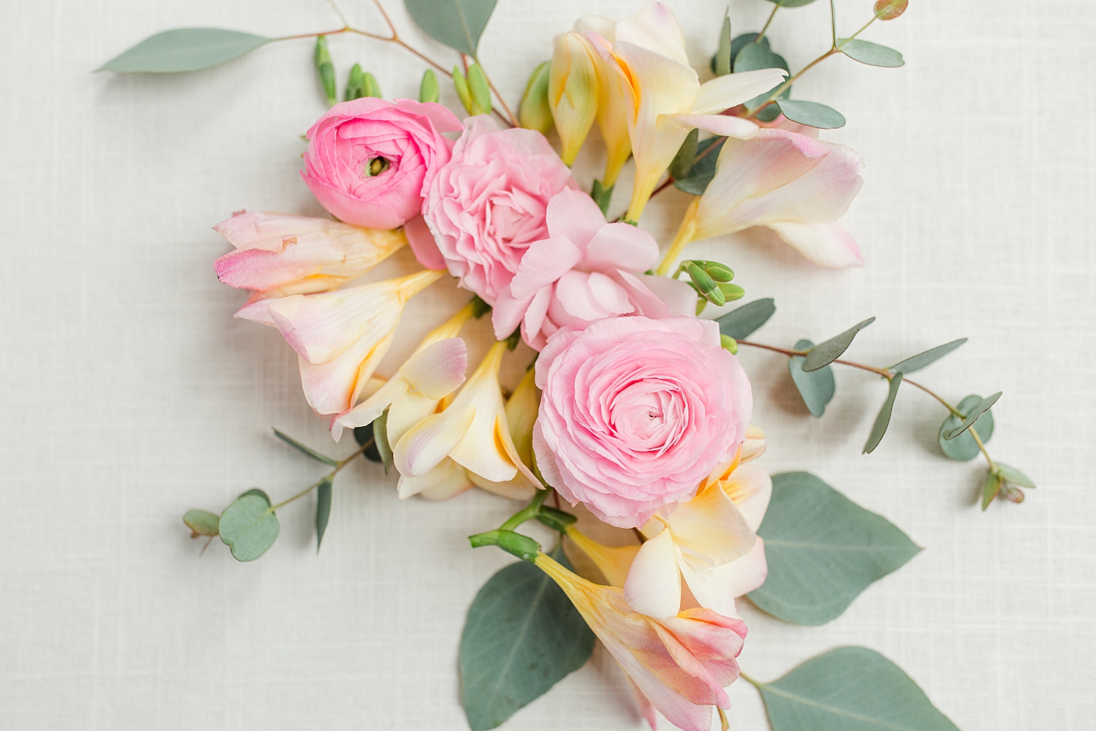 Hackney Warehouse Wedding Flower detail with garden roses and ranunculus Photo