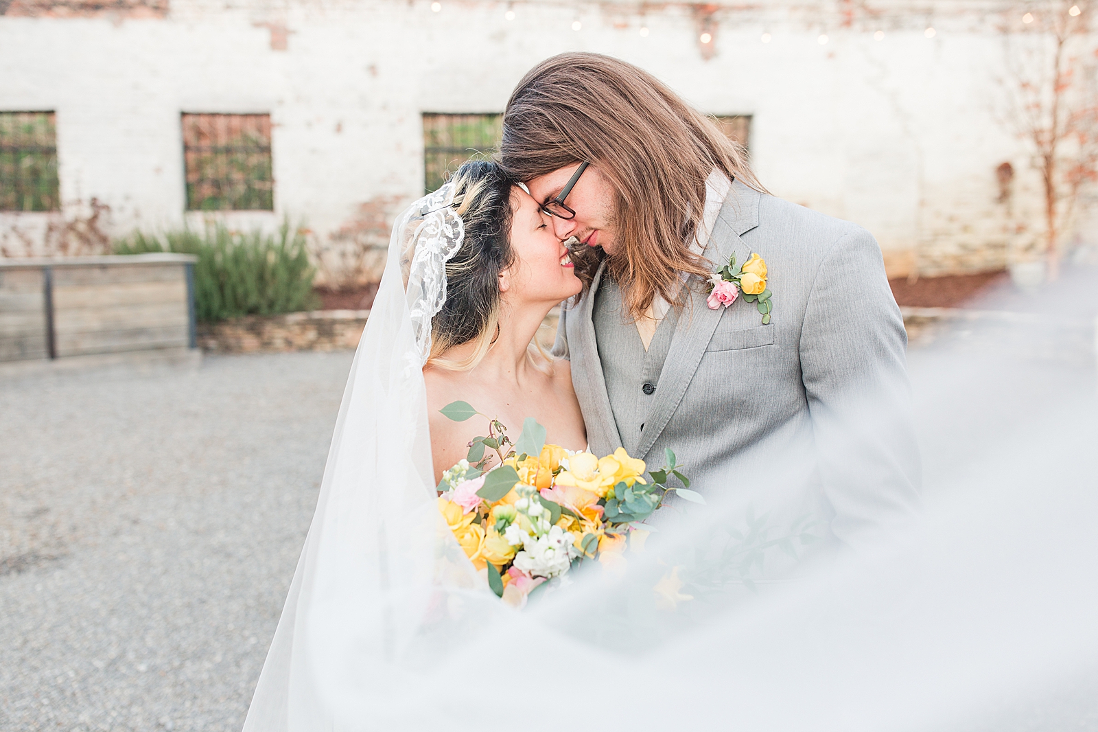Hackney Warehouse Wedding Bride and Groom smiling nose to nose Photo