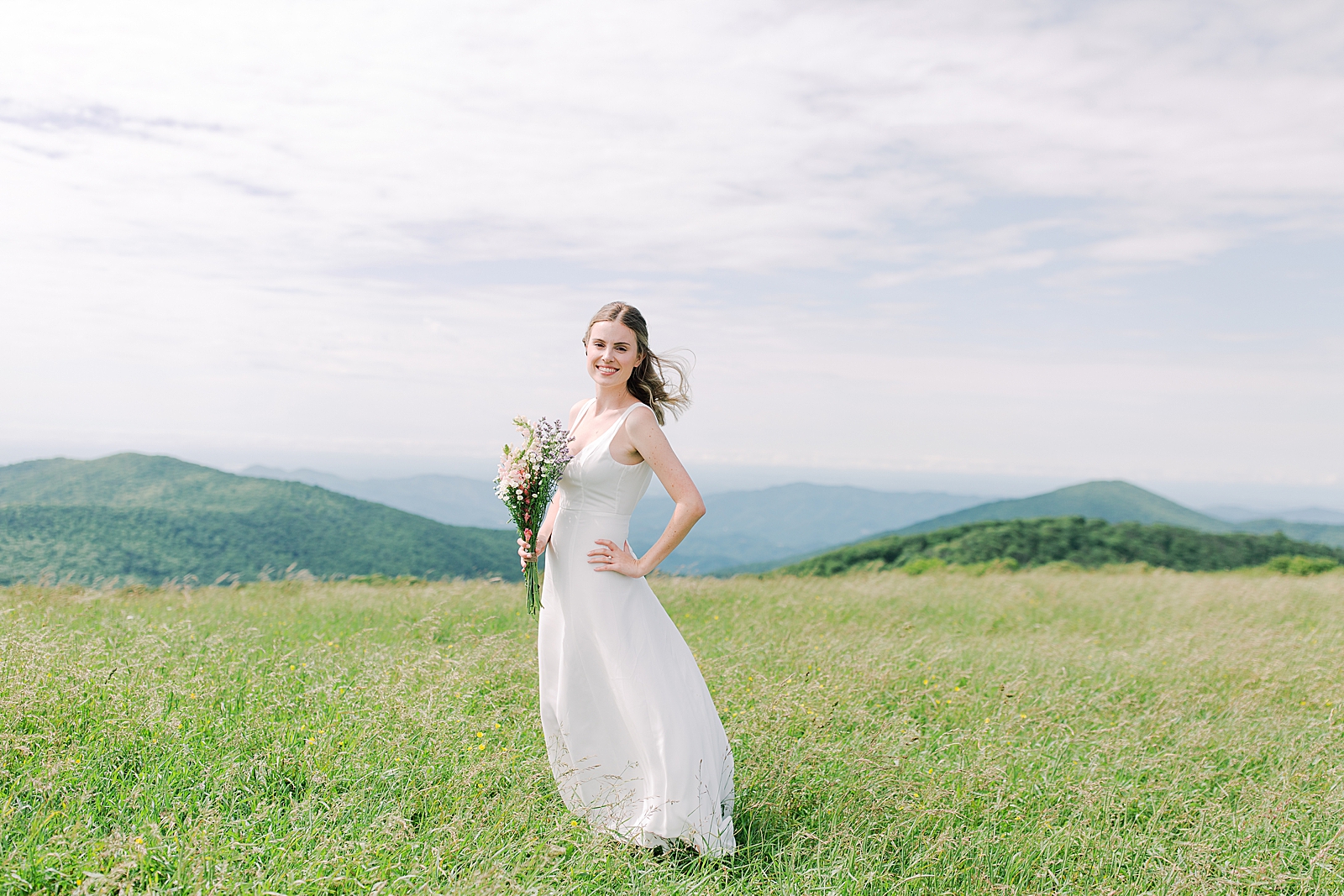 Max Patch Elopement Bride Smiling in Filed Photo