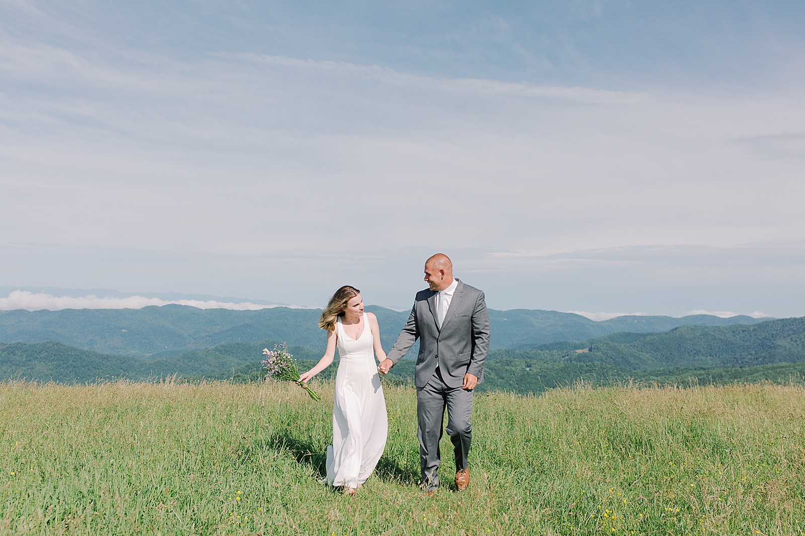 Max Patch Elopement Bride and Groom Walking Holding Hands Photo