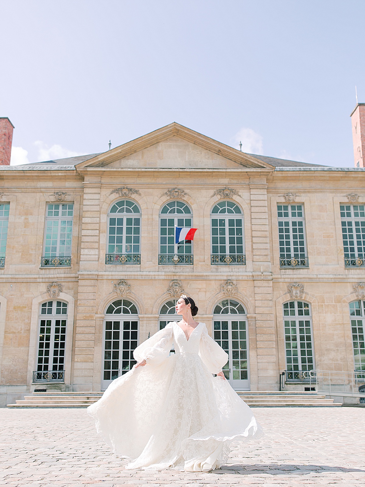 Musée Rodin Wedding Bride Twirling in Courtyard Photo