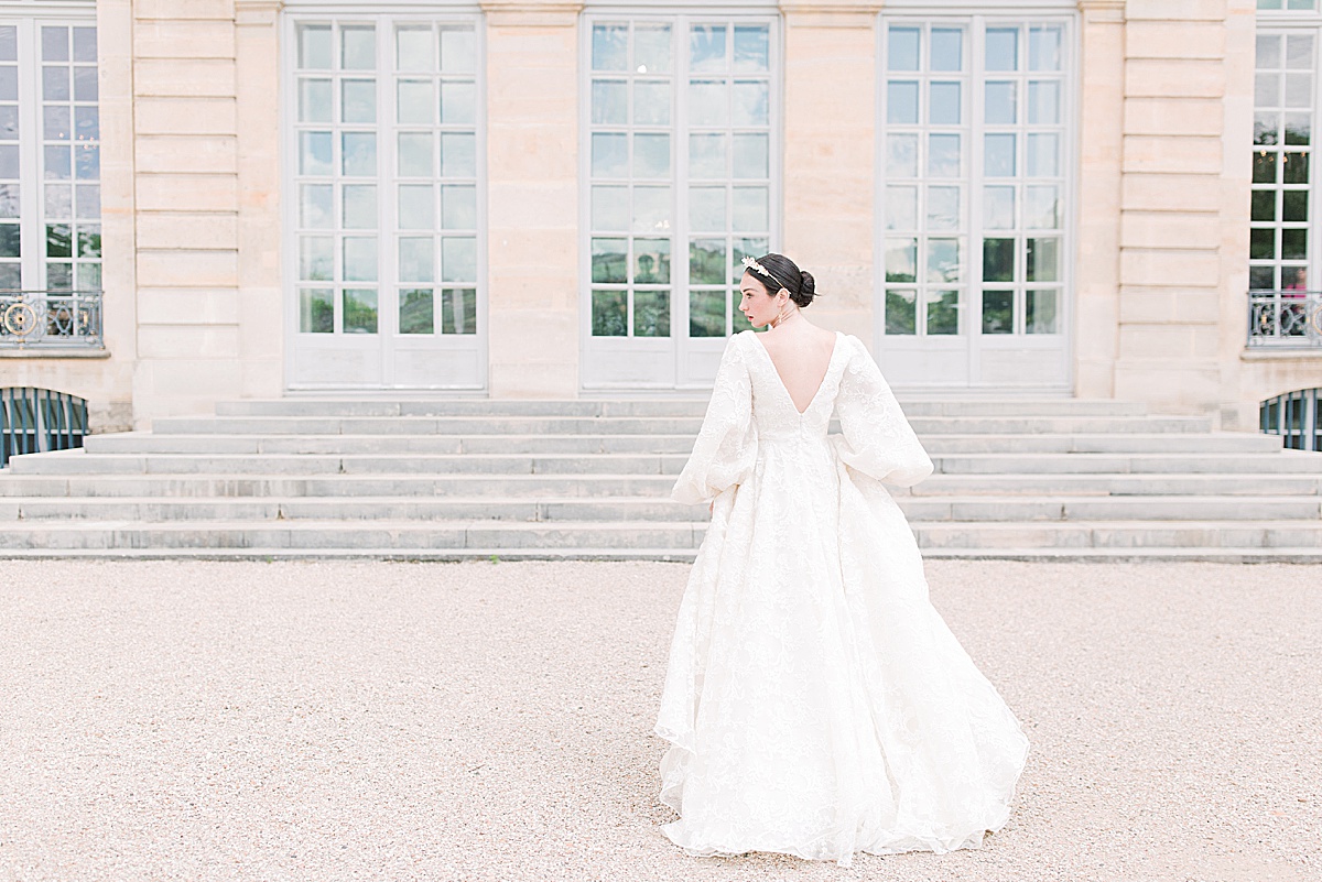 Musée Rodin Wedding Bride walking away looking over shoulder Photo