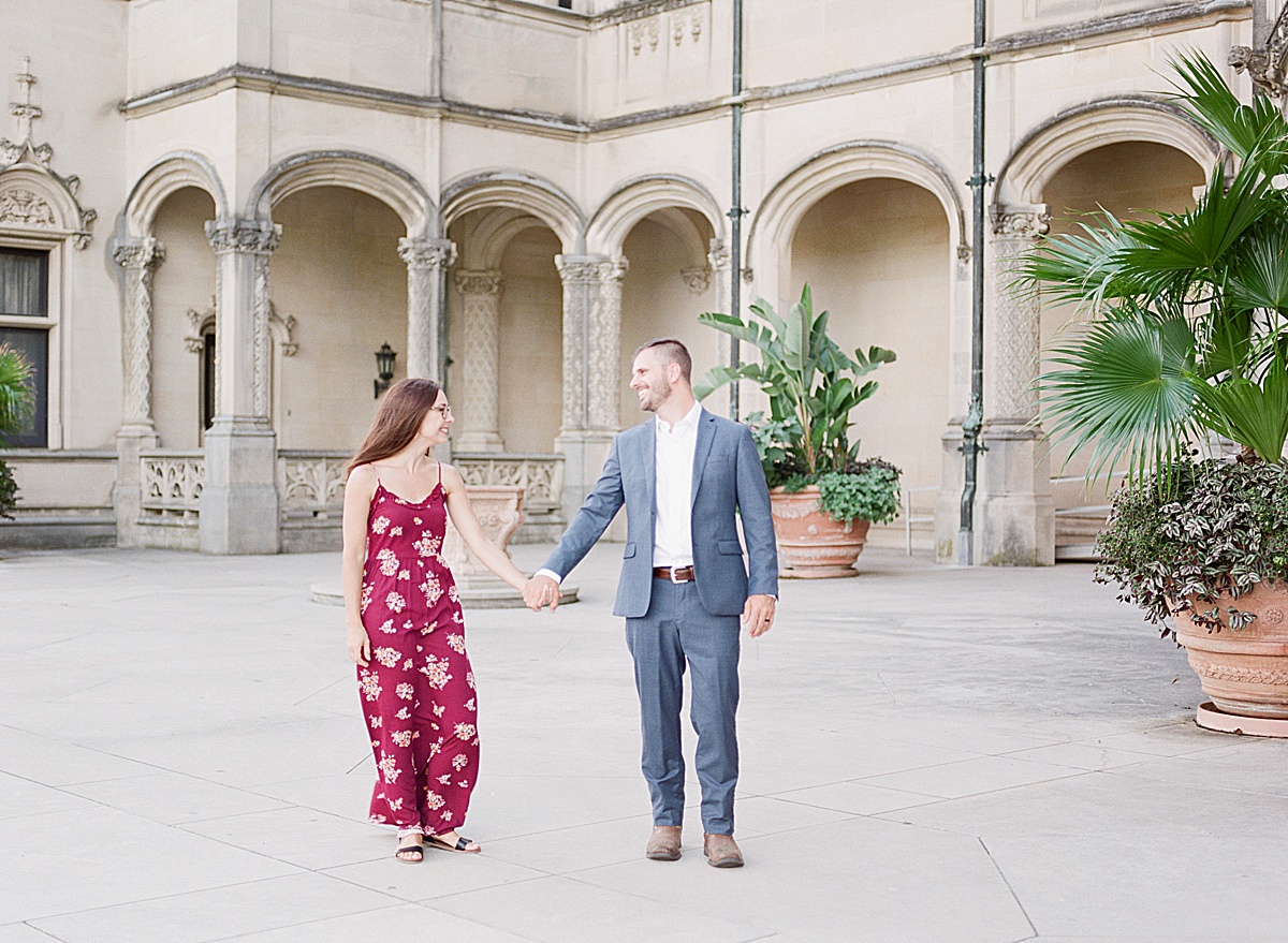 Biltmore Estate Anniversary Session Couple holding hands walking Photo