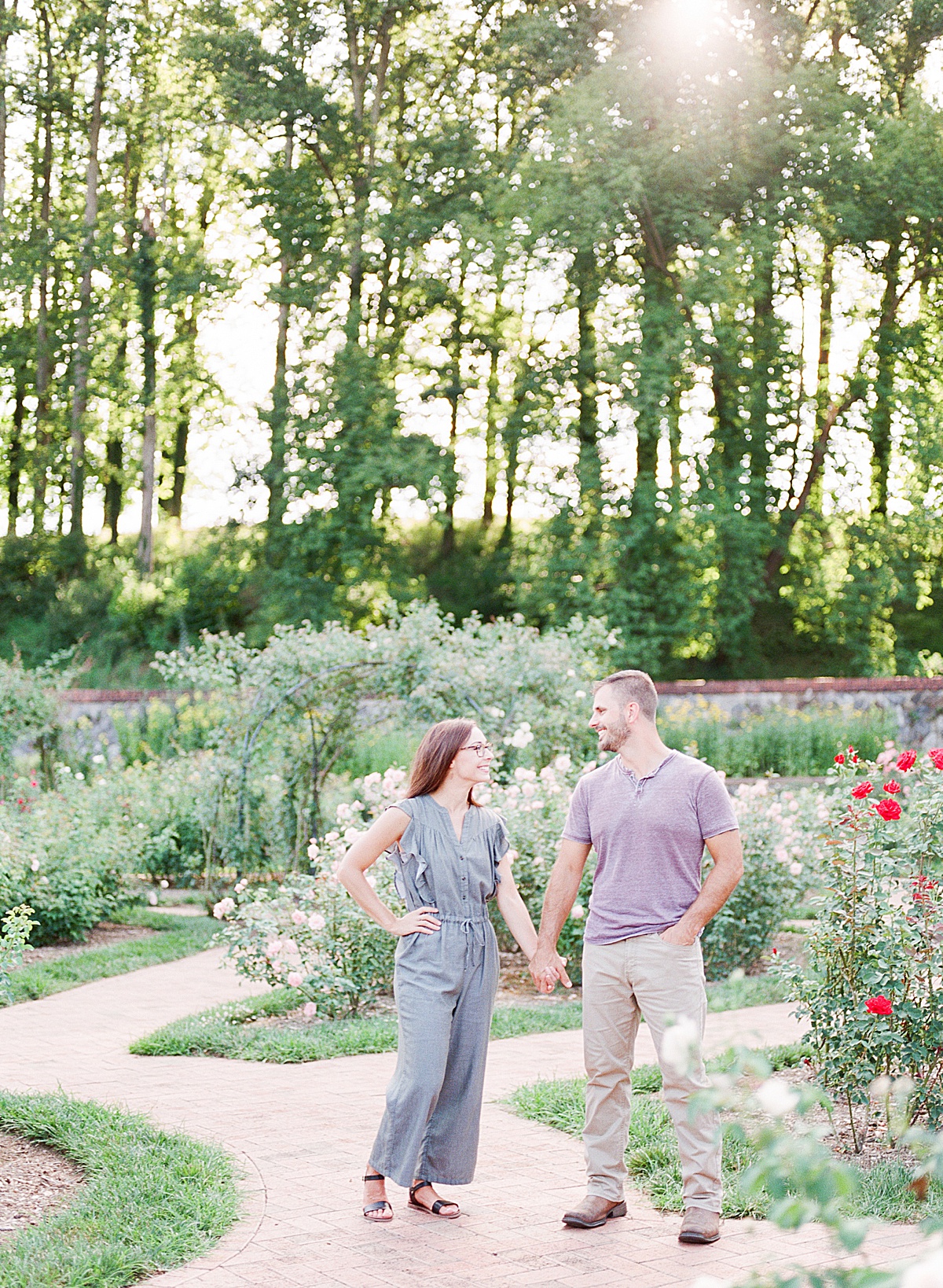 Biltmore Estate Anniversary Session Couple holding hands in gardens Photo