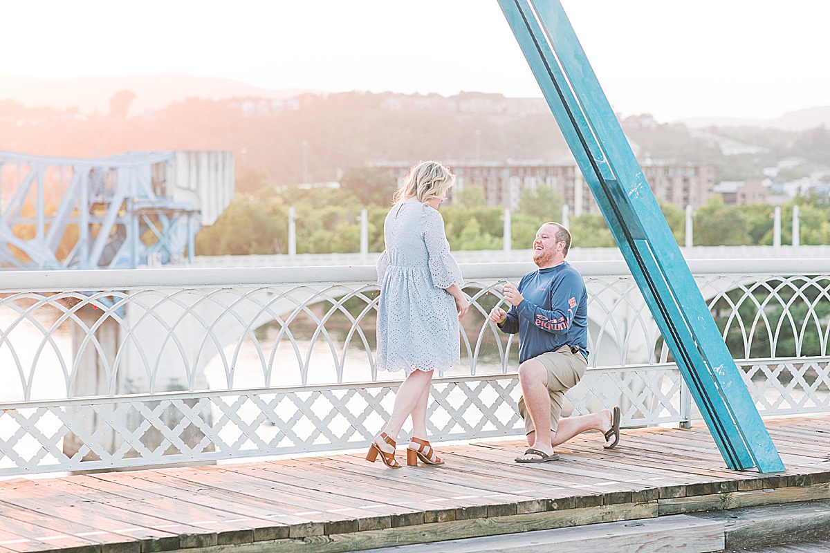 Chattanooga Proposal Austin down on one knee proposing on Walnut Street Bridge Photo