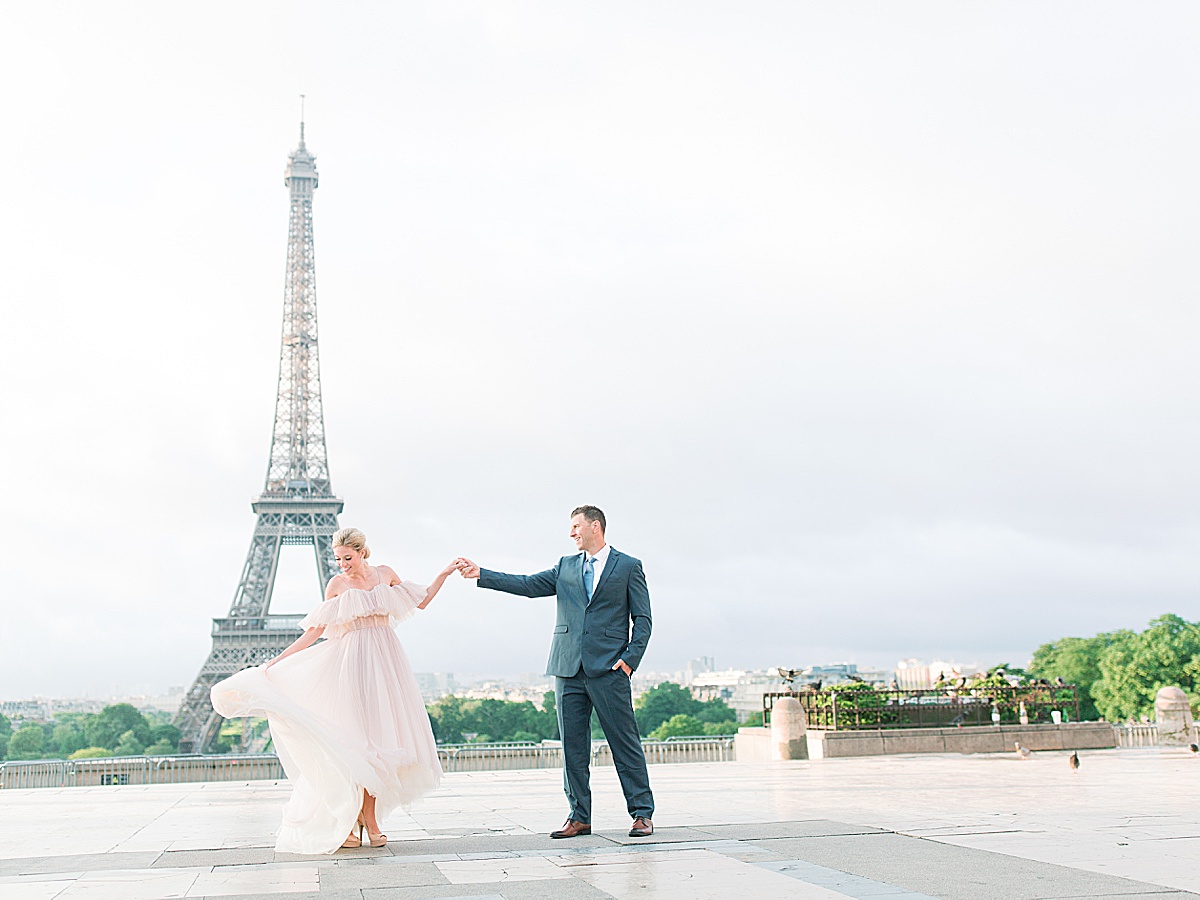 Eiffel Tower Wedding Groom Twirling Bride on the Trocadero Photo