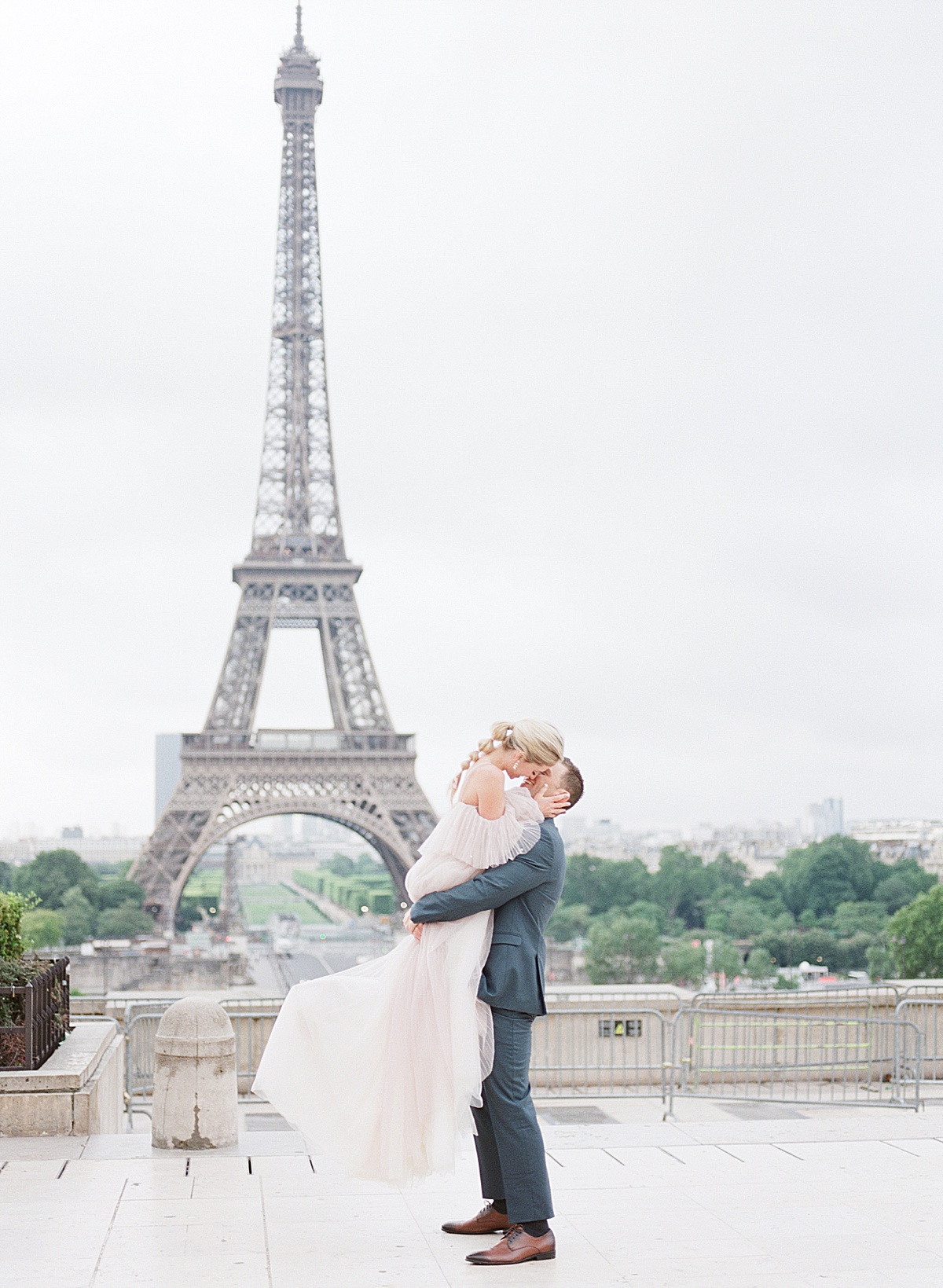 Eiffel Tower Wedding Bride and Groom Kissing Photo