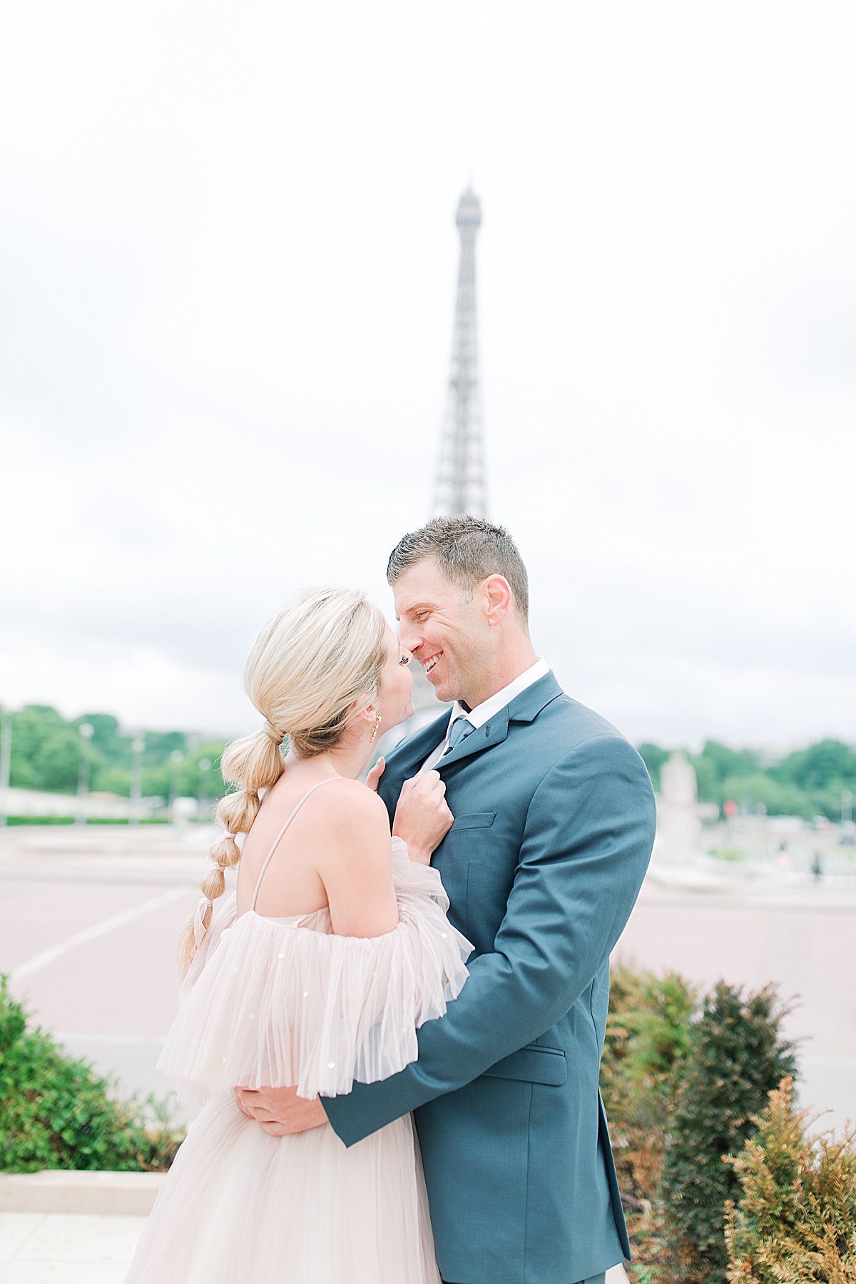 Eiffel Tower Wedding Bride and Groom Snuggling Photo