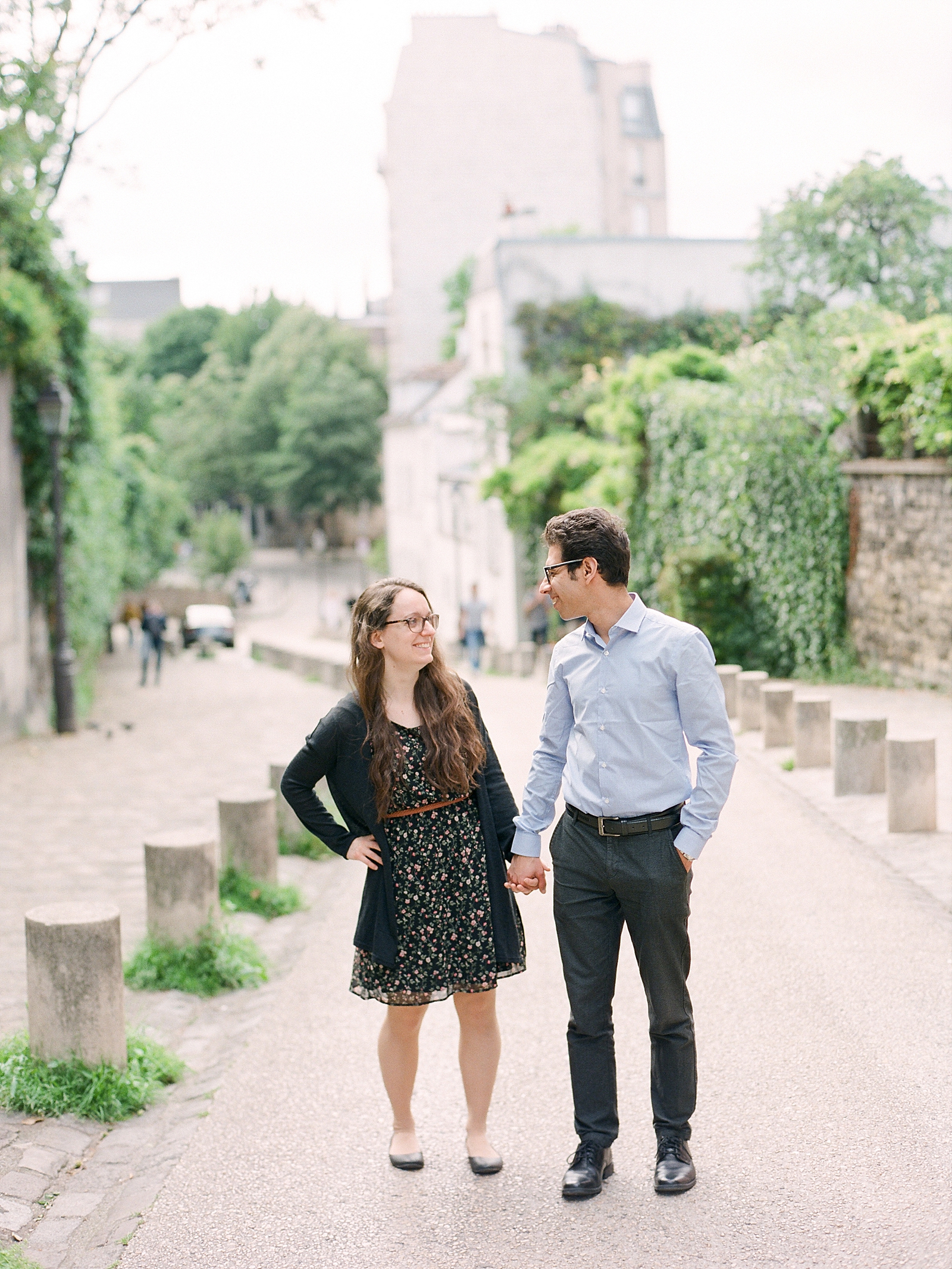 Eiffel Tower Engagement Session couple smiling at each other Photo