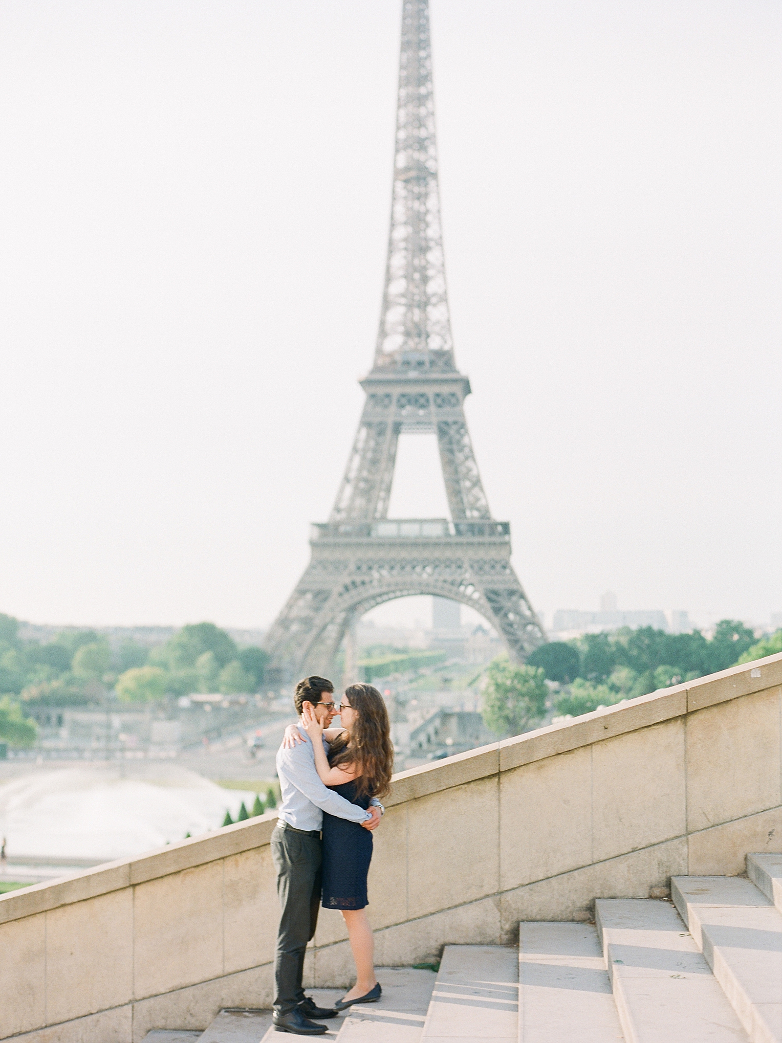 Eiffel Tower Engagement Session couple hugging Photo