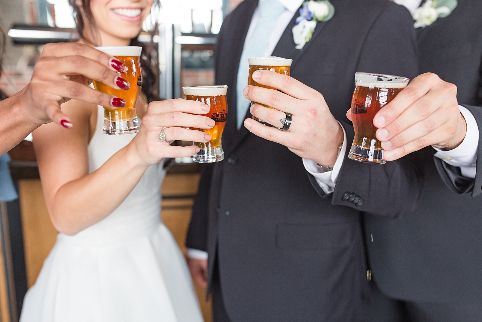 Glover Park Brewery Wedding Bridal Party toasting detail of hands Photo