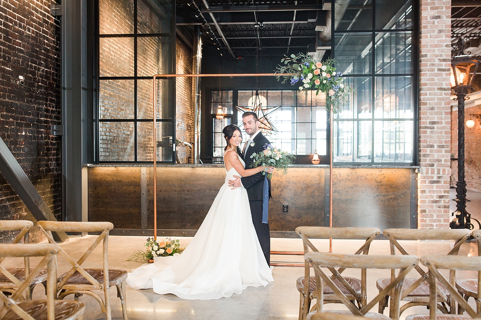 Glover Park Brewery Wedding Bride and groom hugging in front of Copper Alter Photo