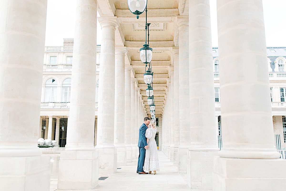 Palais Royal Engagement Couple Kissing in Between columns Photo