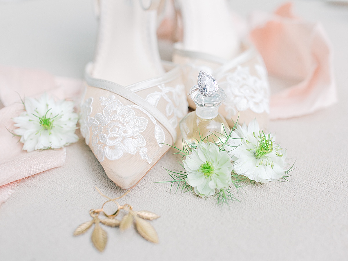 Swan House Wedding Bridal Details Heels, Ring, Perfume Flowers and Earrings Photo