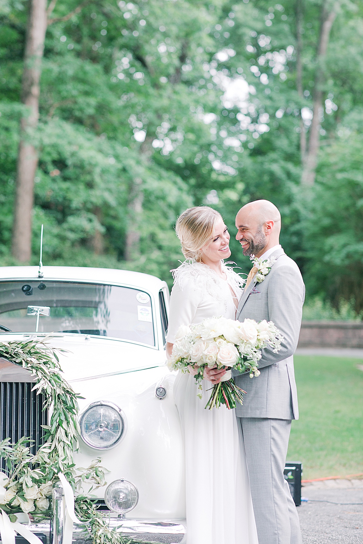 Swan House Wedding Bride and Groom Laughing in Front of Classic Car Photo