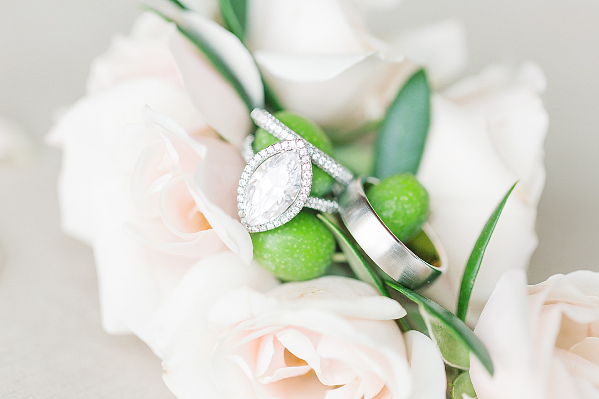 The Ridge Asheville Wedding Venue Detail of Rings on flowers Photo