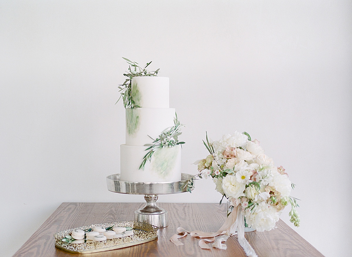 The Ridge Asheville Wedding Venue White and Green Cake Macaroons and Bouquet Photo