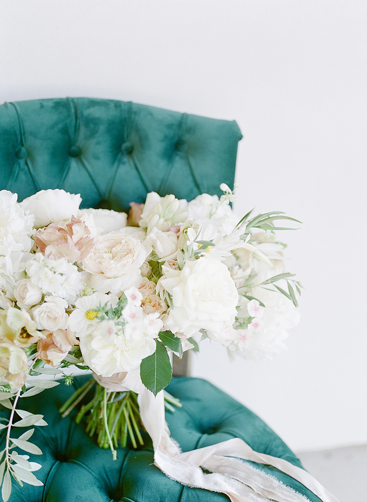 The Ridge Asheville Wedding Venue Bridal Bouquet on Green Chair Photo