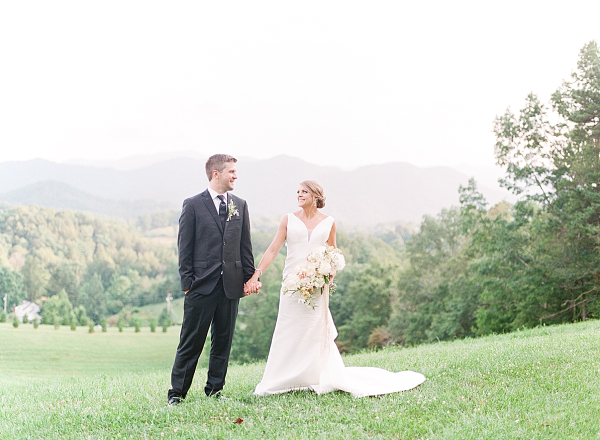 The Ridge Asheville Wedding Bride and Groom Holding Hands Photo