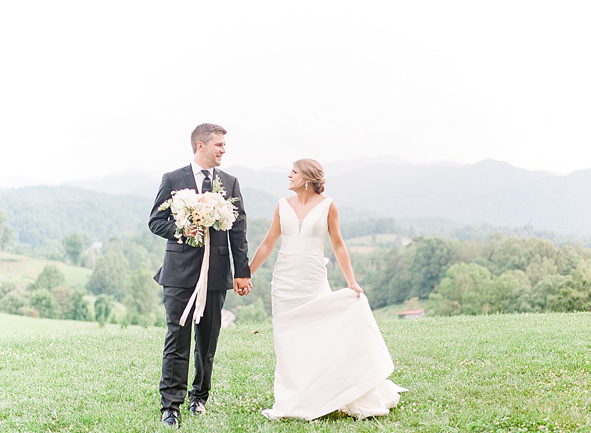 The Ridge Asheville Wedding Bride and Groom Holding Hands Photo