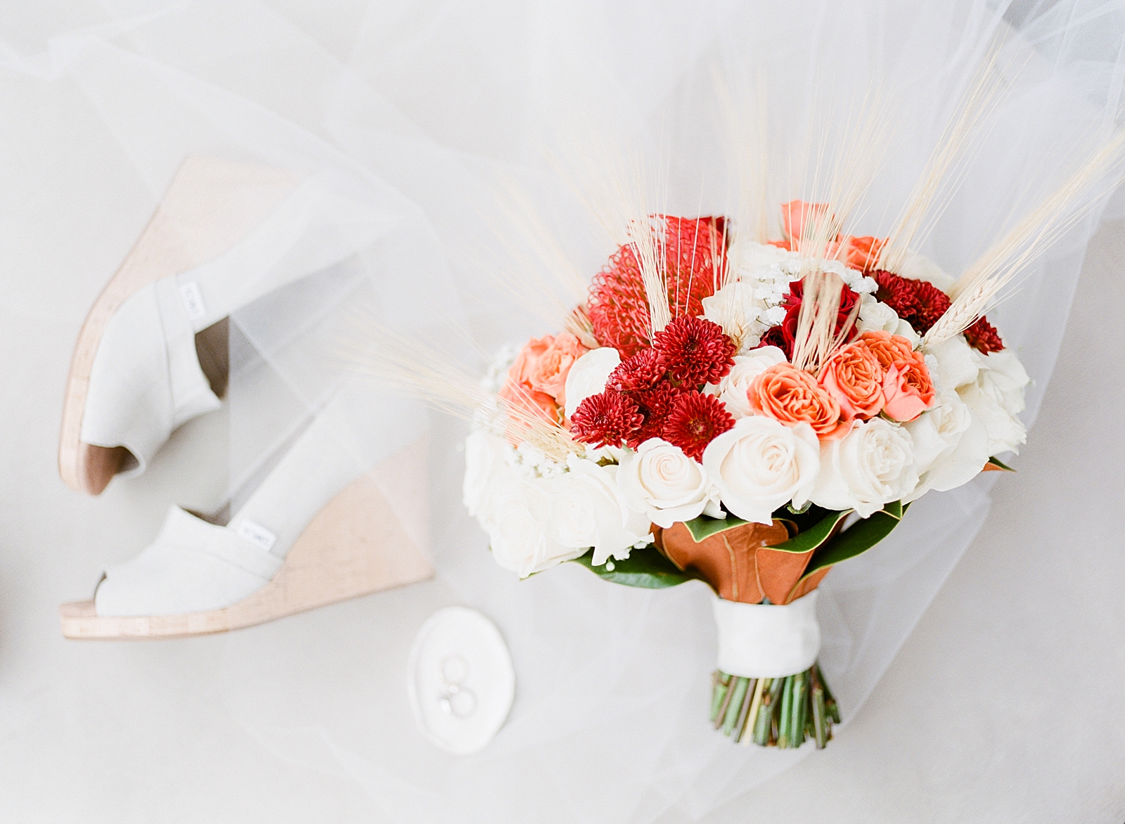 Dairy Barn Wedding Bridal Shoes Rings and Bouquet Photo